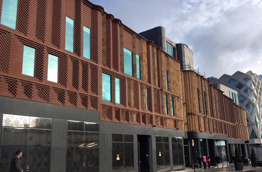 Victoria Gate Arcade in Leeds with precast panels faced withKetley Staffs red bricks and specials
